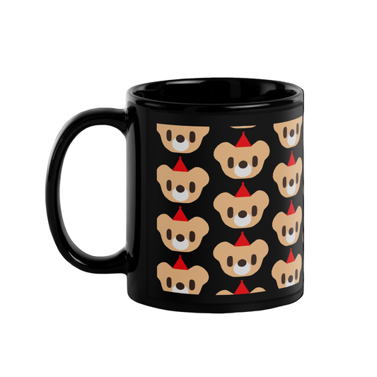 Black mug with teddy bear pattern on a white background